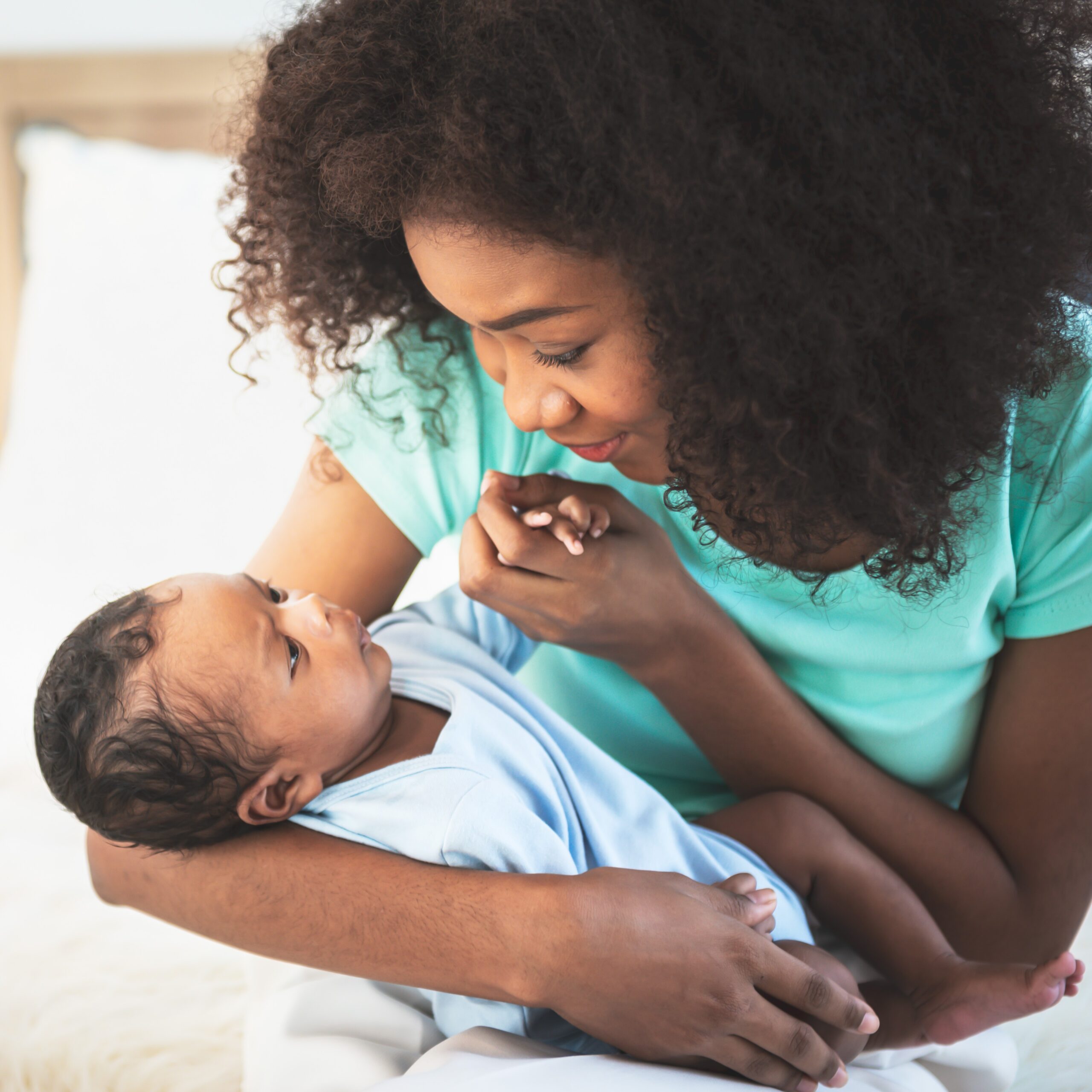 bigstock-An-African-American-Mother-Loo-477714445